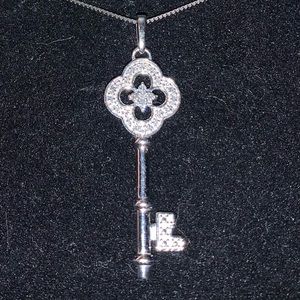 14K White gold and diamond key pendant adjustable necklace.